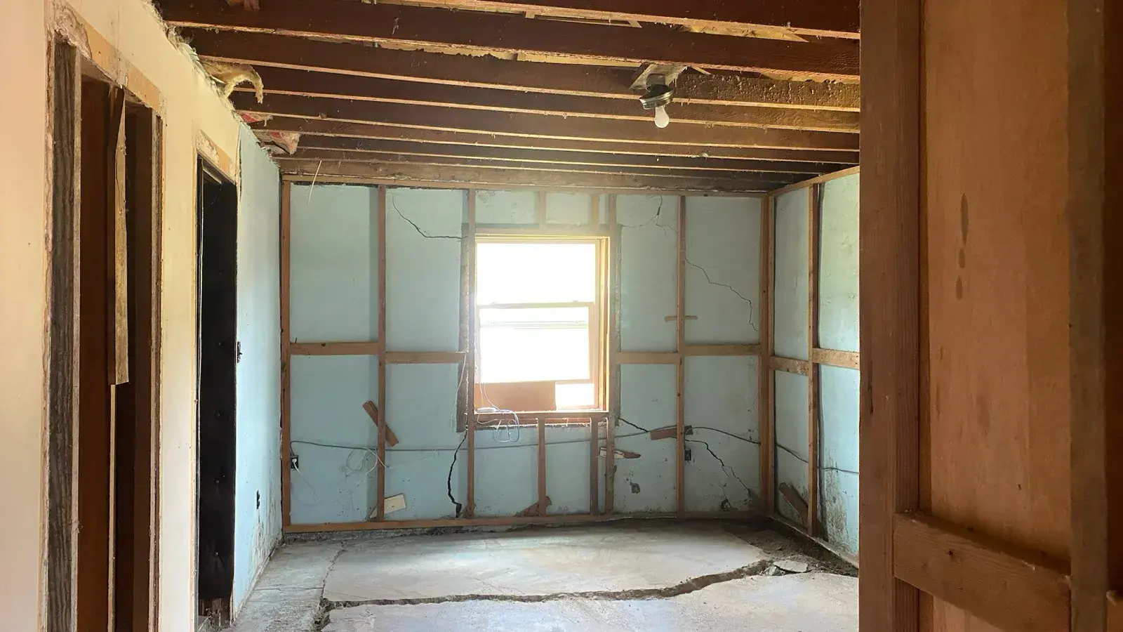 Before: Bedroom finished with new wood flooring